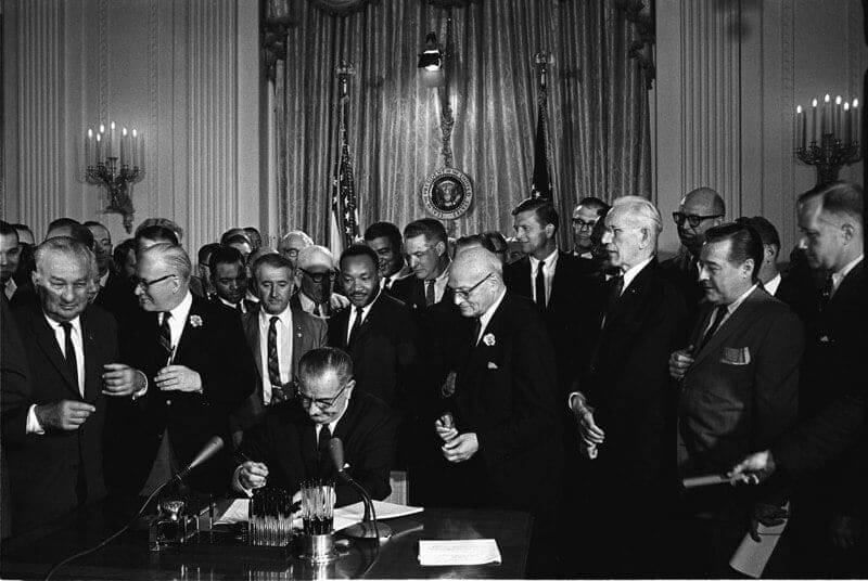 img 8368 Systemic racism president lyndon b. Johnson signs the 1964 civil rights act as martin luther king, jr. , and others, look on.