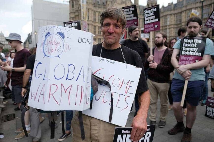 climate-protest-london Environmental policies. A protester amid the protests against trump and his anti-climate agenda
