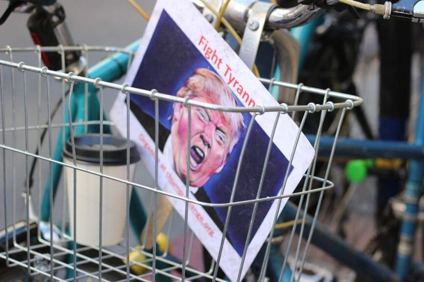 fight trump tyranny sign stocksnap Our president is a fascist a fight tyranny sign with a photo of donald trump in the basket on a bicycle