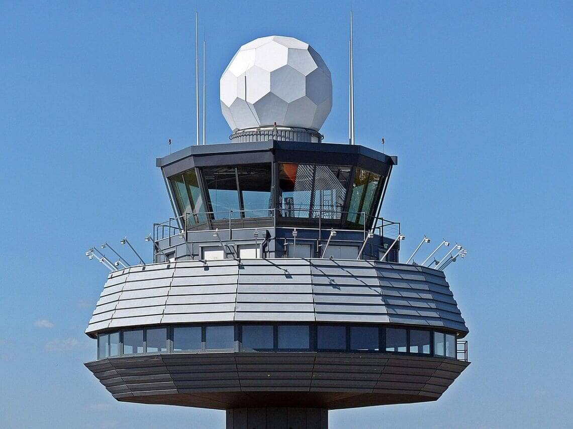 air traffic controllers walz Air traffic controllers work in a control tower like this one.