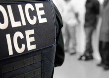 ice raid agent Ice agent from behind