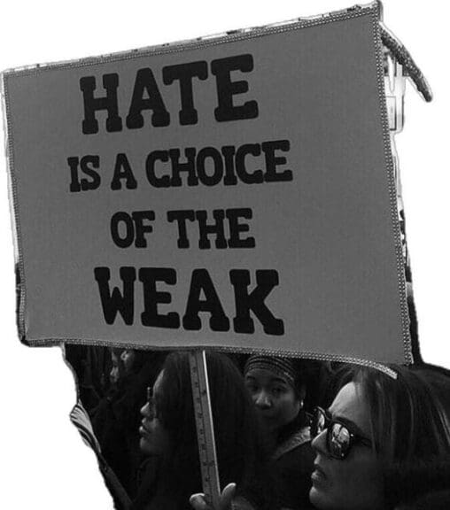 Protest sign that says people who hate are weak.