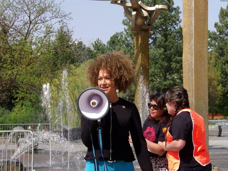 rachel dolezal Rachel dolezal speaks into a bullhorn at a rally as part of the naacp.